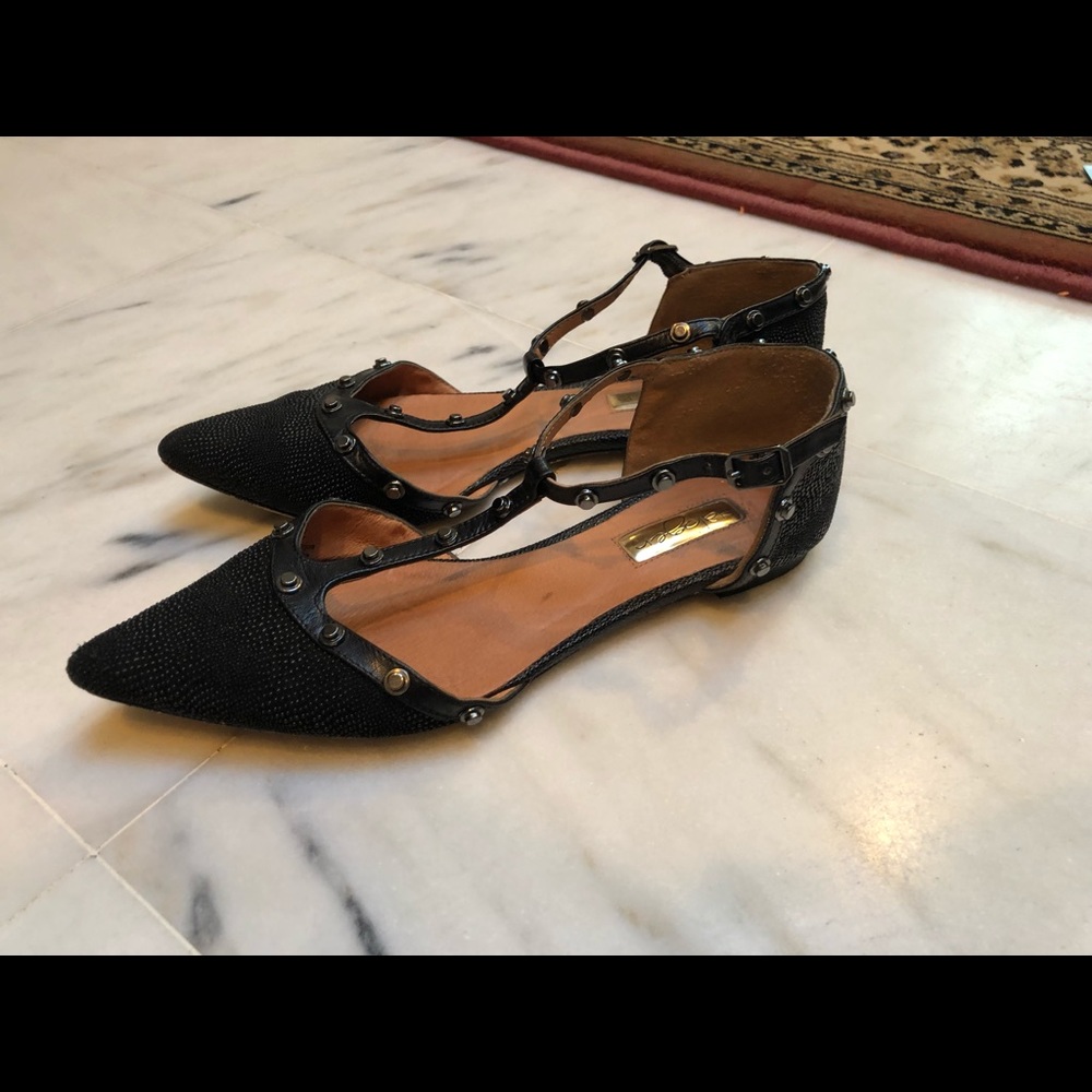 Black flats with spiked edges
